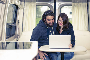 RV Insurance Online - Couple looking at laptop