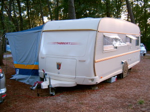 Travel Trailer Insurance - campsite with travel trailer