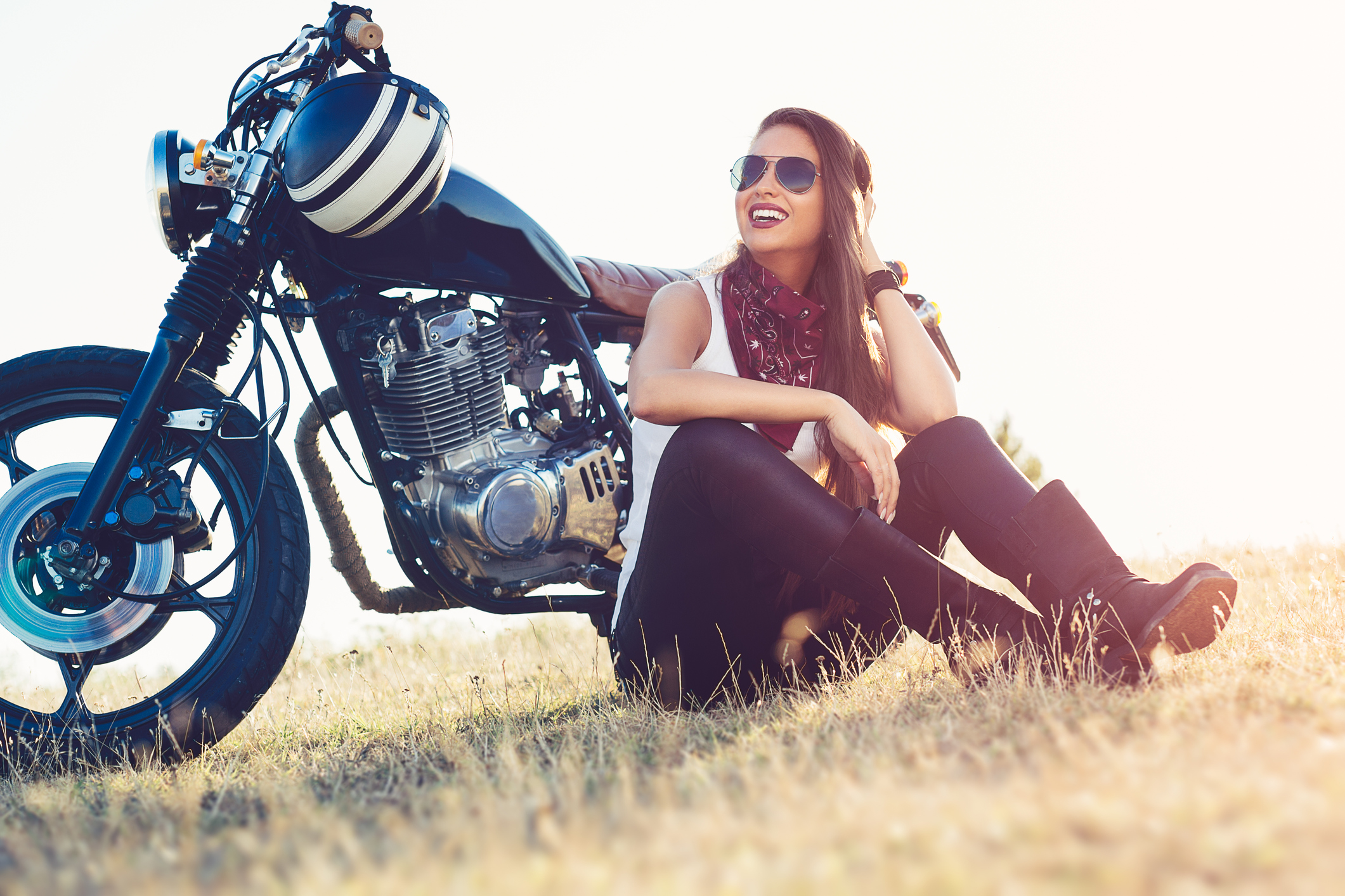 Beautiful Biker Woman Sitting By Her Motorcycle On A Highway Rv Insurance 0360