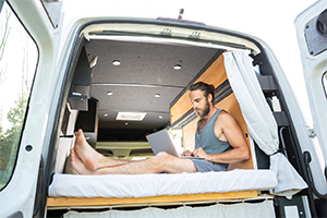 man researching RV insurance rates