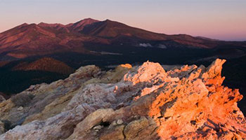 Image of the sunset crater national monument, which is a rocky terrain destination located in Arizona. 