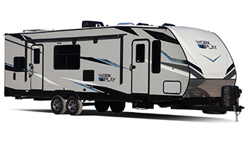 Image shows the Work and Play Toy hauler, which is an eco friendly toy hauler made by Forest River. 