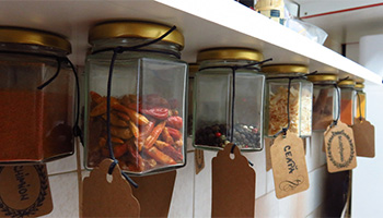 hanging mason jars in an rv kitchen for storage