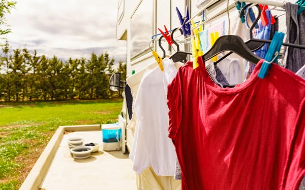 rv laundry hanging up to dry outside of an RV