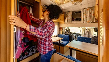 a women restocking their RV