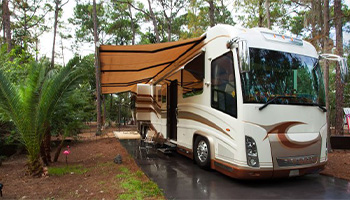 An RV parked at Fort Wilderness Resort in Florida