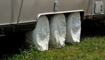 RV tires covered while in storage